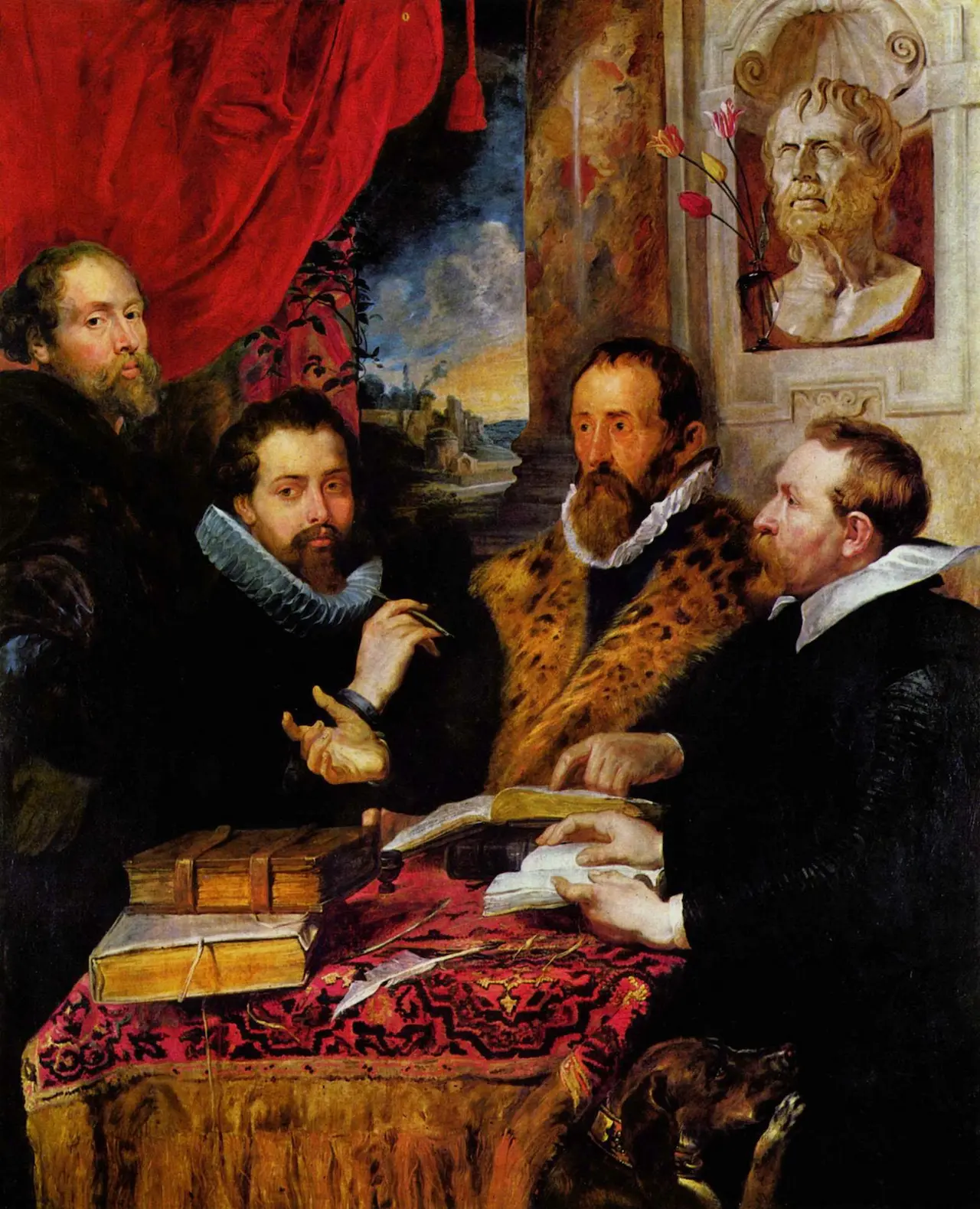 A classical oil painting depicting a group of four European men in 17th-century attire, possibly a self-portrait by Peter Paul Rubens with three friends, seated or gathered around a table with books and papers. The men have serious expressions and are richly dressed in dark clothing, with one man wearing a fur-collared garment. A red drape hangs behind them, and in the upper right, there is a marble bust of a classical figure, likely Seneca, affixed to the wall.