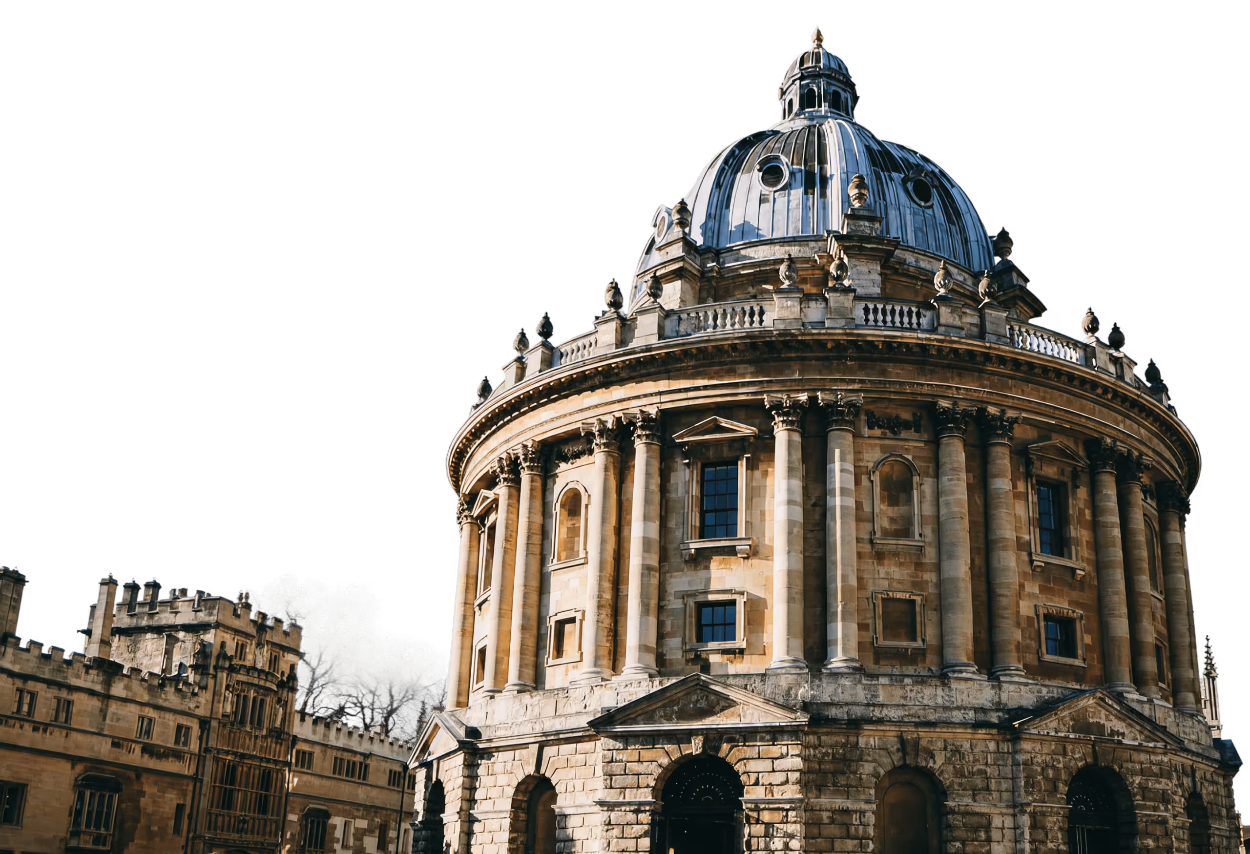 A prominent, eye-level view of the Radcliffe Camera in Oxford, a large circular building in the English Baroque style, featuring a high, dark lead-covered dome.